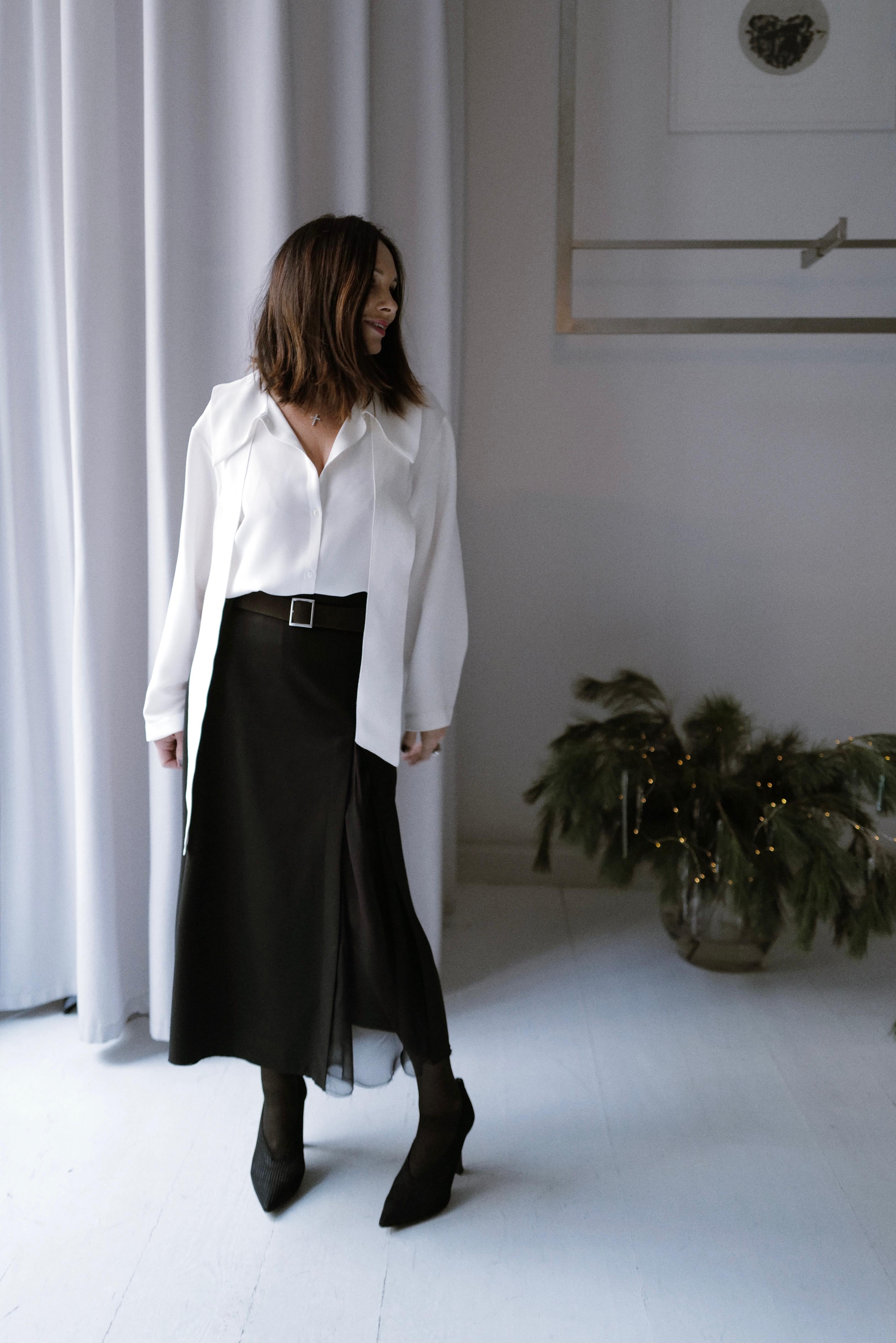 Finest lightweight wool skirt featuring a chiffon slit