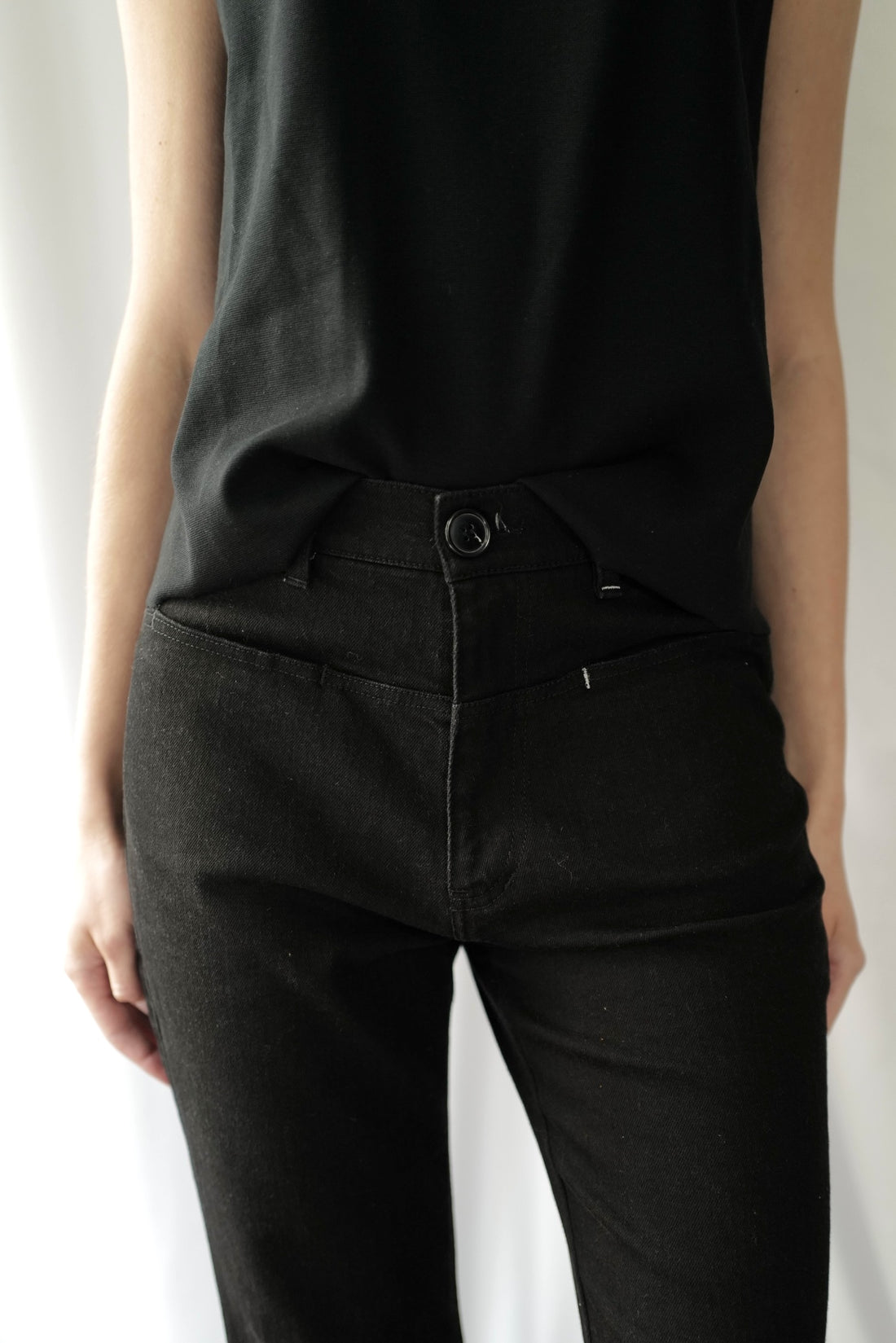 Black Denim High-Rise Flared  Jeans with Eco Leather back pocket.