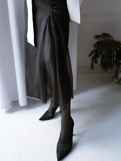 Finest lightweight wool skirt featuring a chiffon slit