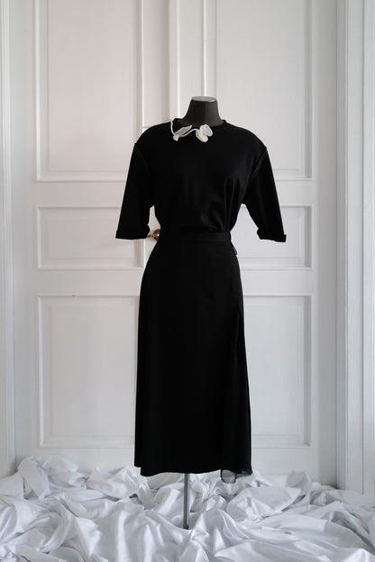 Finest lightweight wool skirt featuring a chiffon slit