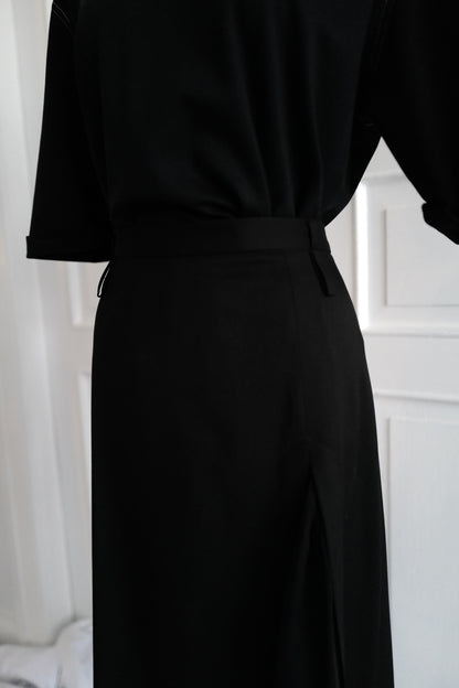 Finest lightweight wool skirt featuring a chiffon slit