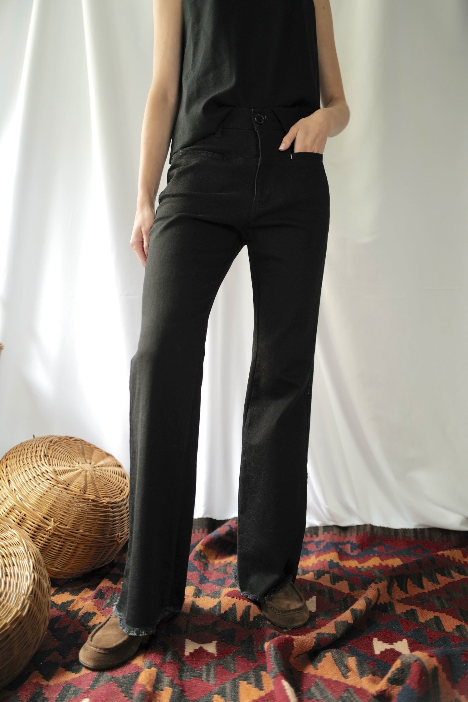 Black Denim High-Rise Flared  Jeans with Eco Leather back pocket.