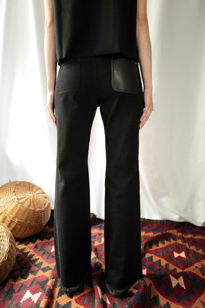 Black Denim High-Rise Flared  Jeans with Eco Leather back pocket.